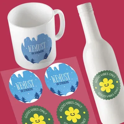 UV DTF stickers shown on mugs and bottles